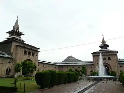 The courtyard of the Jama Masjid, Srinagar. Hari Parbat is visible in the background.