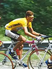 Jan Ullrich riding a bicycle wearing a yellow jersey