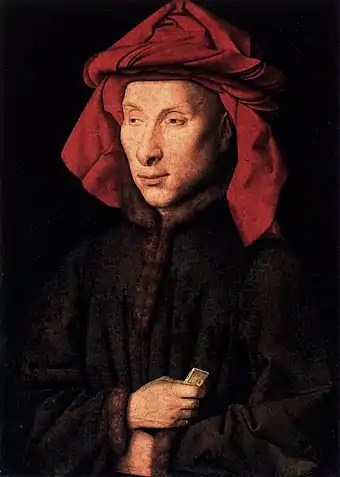 Portrait presumed to be of Giovanni Arnolfini by Jan van Eyck, c. 1438. The chaperon is worn with cornette tied on top of the head, and the patte hanging behind (style  C). The bourrelet is twisted.