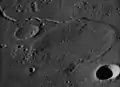 Oblique view of the ghost crater Jansen R ("pancake" at center) and Jansen D crater (lower right)