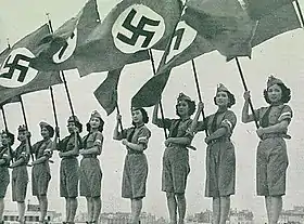 Female members of the Nichigeki dancing team welcoming the Hitlerjugend at Nichigeki Music Hall in Tokyo