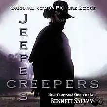 A shadowy figure stands in the center of the album cover for "Jeepers Creepers".