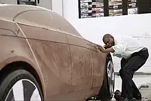 Jelani Aliyu pictured working on the Chevy volt concept prototype.