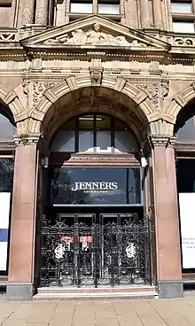 The locked gates of the entrance to Jenners department store (March 2021).
