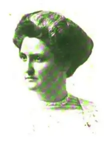 B&W portrait photo of woman with hair in an up-do