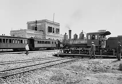 Image 4The Jerusalem Railway Station c. 1900. The locomotive on the turntable is "Ramleh" (J&J No. 3), a Baldwin 2-6-0. The station was the terminus of the Jaffa–Jerusalem railway until its closure in 1998. Today, the station is abandoned and suffering from neglect and vandalism, although it is one of 110 buildings selected for preservation in Jerusalem.