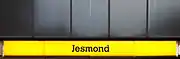 Station signage at Jesmond, branded in the original corporate colour scheme.