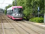 Tram 09 in silver and magenta livery in 2008