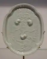 Jingdezhen dish with moulded decoration, Yuan dynasty, c. 1300-1368
