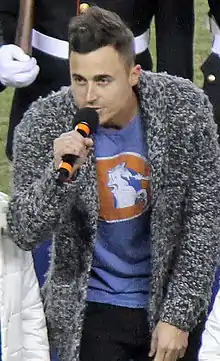 King performing the national anthem at Sports Authority Field at Mile High in December 2013