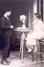 Jeanne Fonssagrives with Joël Martel and a plaster bust he made of her in 1915.