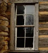 John Oliver Cabin window/chimney detail