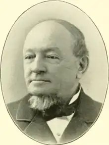 Wieting pictured in a 1903 book. He is wearing a collared shirt.