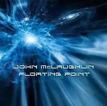 Outer space-themed black/blue image: has John McLaughlin then Floating Point on it in a white sci-fi font