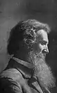 Black and white photo of a man with a long beard, 1915.