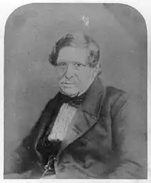 Monochrome photograph of Lord Lyndhurst seated wearing a suit