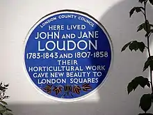 Circular plaque reading "London County Council – Here lived John and Jane Loudon – 1783–1845 and 1807–1858 – Their horticultural work gave new beauty to London squares"