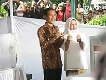 Joko Widodo votes in Indonesia's 2014 presidential election