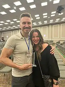 Jonathan Janz with his wife at Scares That Care in Williamsburg, VA on March 31, 2023