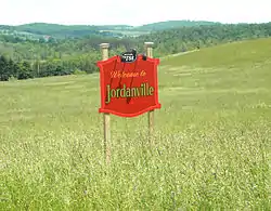 Settlement sign for Jordanville