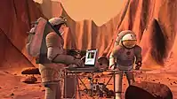 NASA concept of Mars-crew analyzing a sample (2004).