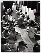 Nurses care for infants in a makeshift maternity ward in besieged Warsaw. Photograph taken by Julien Bryan and published in Life Magazine, September 1939