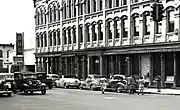 The Ann Arbor Bus Depot in 1943, to the left of the Savings Bank Building