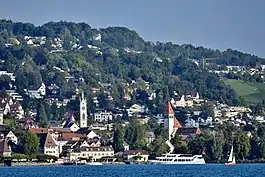 Küsnacht and Küsnachter Tobel, as seen from ZSG ship MS Helvetia on Zürichsee in Switzerland