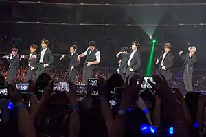 Super Junior performing Mr. Simple at KCON 2015 From left to right: Ryeowook, Donghae, Leeteuk, Kangin, Siwon, Yesung, Eunhyuk, Kyuhyun and Heechul