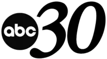 The ABC network logo next to an italicized black serif numeral 30