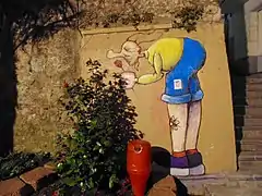 Integration of graffiti into its environment, Zumaia, Spain (2016)