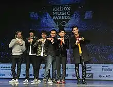 Press conference before the 10th KKBOX Digital Music Chart. From left: Fire Extinguisher Orchestra (1st to 4th from left), Huang Zijiao, Chen Yanyun.