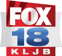 A logo for Fox affiliate KLJB, one of many examples of a Fox station still using searchlights in their logo.