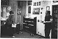 Sitting is Kathy Dolson, behind her is Matthew Koebbe and by the wall is Steve Hendren. Pic is around 1986, in the second version of the old T-6 building.