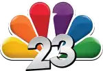 A silver slightly angled number 23 with a black drop shadow superimposed over the NBC peacock.
