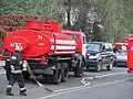 Fire engines and emergency service personnel responding to an incident in Kyiv, 2010