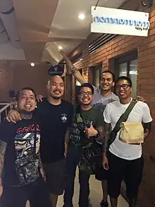 A group shot of the band Kamikazee in 2015