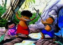 A boy in shorts and wearing a paper hat holds a stick. He crosses the stick against a wooden sword, held by another boy who wears a red sarong (a wrap-around garment). A girl in a dress stands behind the sword-wielding boy.