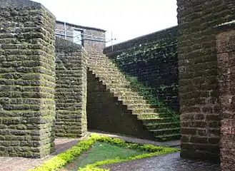 The stairway leads to the top of the fort wall. Note that the entire fort is made with laterite material.