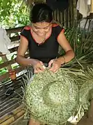 Karagumoy being woven into a hat (kalo)