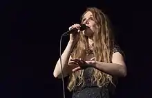 Kari in São Paulo, Brazil, singing with The Sirens, a project involving fellow vocalists Liv Kristine and Anneke van Giersbergen
