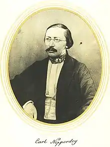 Man with glasses, large mustache, suit, receding hairline
