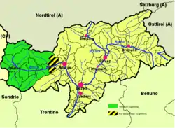 Vinschgau district (highlighted in green) within South Tyrol; the yellow-black stripes mark the geographical extent of the valley