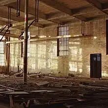 A dilapidated industrial building interior