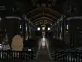 The communion rails and the nave as seen from the sanctuary.