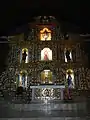 The high altar and main retablo of St. Mary Magdalene Church.