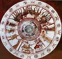 Painted ceiling in a round shape, depicting people and horses