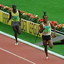 Image 2Kenenisa Bekele leading in a long-distance track event (from Track and field)