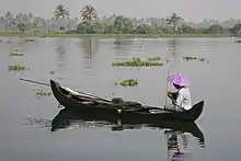 A boat in a canal near Vembanad lake