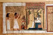 Kha and Merit stand on the left, adoring Osiris, seated inside a kiosk